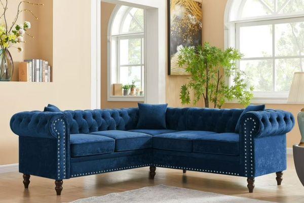Sofa nhung cao cấp có thiết kế dạng góc chữ L bo cong mềm mại